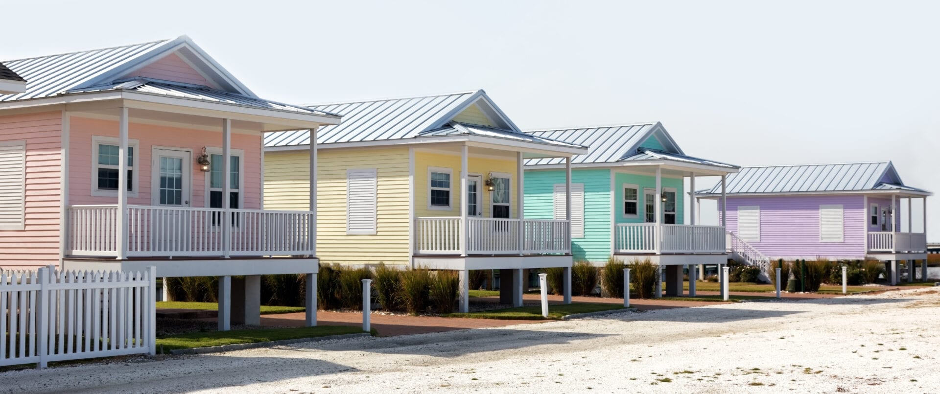 Colorful pastel summer rental cottages.